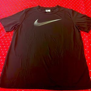 T - shirt is black , brand Nike and size is small.